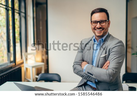 Similar – Image, Stock Photo Portrait Of Young Businessman Wearing Mask Standing In Modern Office During Health Pandemic