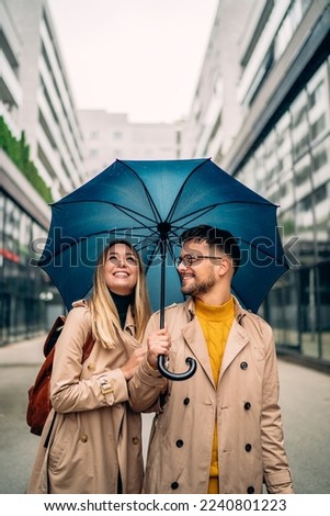 Similar – Dreamy modern man walking along city street