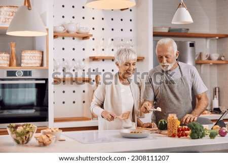 Similar – Image, Stock Photo Senior woman preparing mushrooms