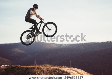 Similar – Image, Stock Photo Man flying through the air with an umbrella