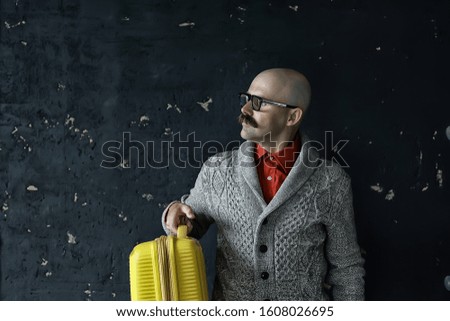 Similar – Image, Stock Photo Portrait of an eccentric rocker man with long purple hair in a green bathroom.