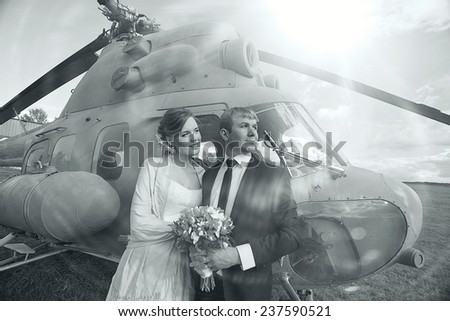 Wedding couple in love vintage aircraft