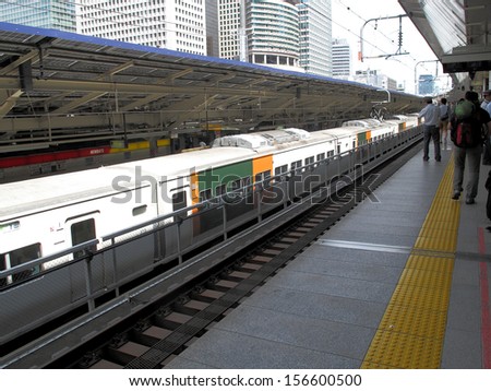 TOKYO, JAPAN- AUGUST 20, 2013: Passenger in Tokyo railway station, it is the main intercity rail terminal in Tokyo, Japan. August 20 2013