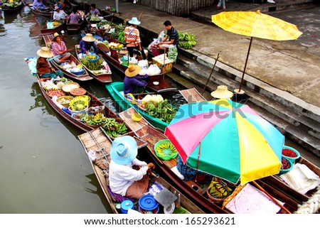 AMPHAWA,THAILAND-NOVEMBER 17,2013:Thaka Floating Market is a market place along the canal that meet with boat vendors selling their wares and partake in Samut Songkhram,Thailand.November 17 2013