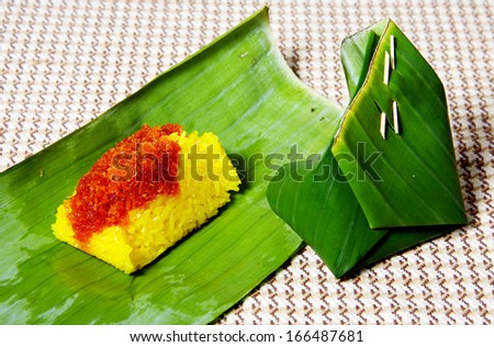 Sweet sticky rice with shrimp warped in banana leaf, dessert in Thai style.