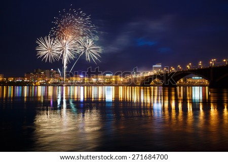 Krasnoyarsk, Russia - May 9, 2014: Fireworks explode on the sky during celebrations of the \