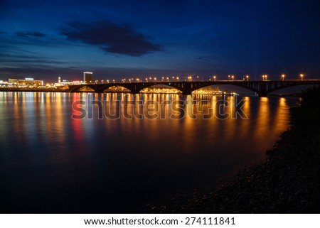 Krasnoyarsk, Russia - May 1, 2015: the bridge through the river Yenisei, a view of the night city of Krasnoyarsk