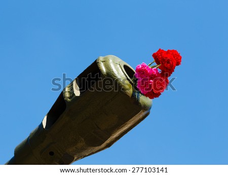 flowers in a gun trunk, celebration of \