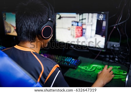 Stock Photo Fighting Young Man Playing Computer Games In Internet Cafe 632647319