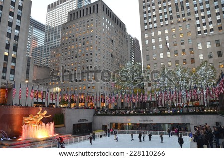 NEW YORK CITY - NOVEMBER 3, 2014: Rockefeller Center Ice skaters and tourists are all around the famous Rockefeller Center on November 3, 2014 in Manhattan, New York City, USA..