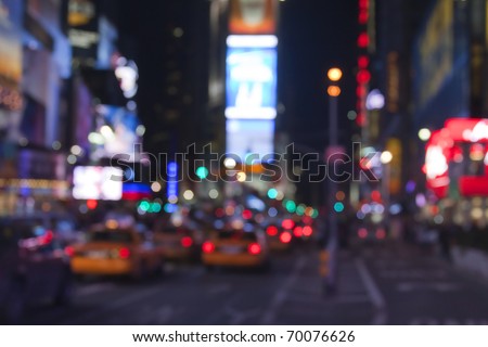 Times Square lights at night/Times Square at Night/Blurred image of Times Square lights and traffic at night