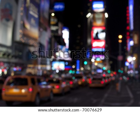 Times Square lights at night/Times Square at Night/Blurred picture of Times Square lights and traffic at night