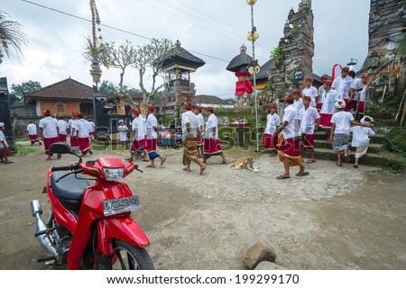 UBUD, BALI, INDONESIA - JUNE 25:  Unidentified local people wearing in traditional indonesian clothes take part in traditional Balinese  ceremony  on June 25, 2013 in Ubud, Indonesia