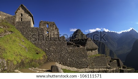 First Qolca (Inca storage houses) ruins that are seen after entering Machu Picchu through the main entrance.