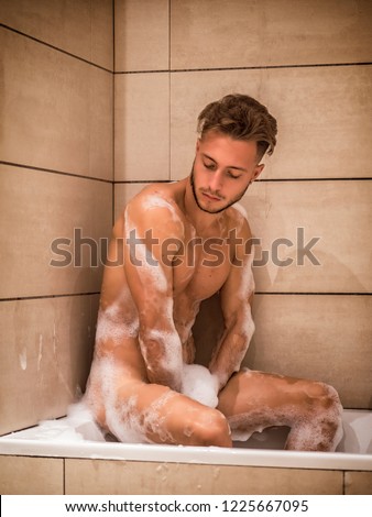 The Men in Baths Thread - Page 2 Stock-photo-handsome-young-man-in-bathtub-at-home-having-bath-sitting-on-tub-edge-1225667095