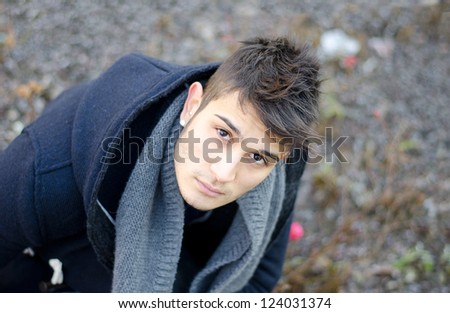 Attractive young man portrait shot from above