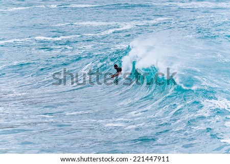 Surfer waiting for a perfect  wave. Big Island, Hawaii, USA