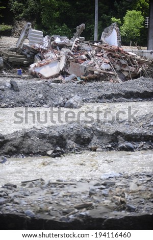 Krupanj-May 19,2014: After recent heavy rains, river Cadjavica went out of stream, causing catastrophic floods and mud slides, wich destroyed town of Krupanj in Macva district in central Serbia.