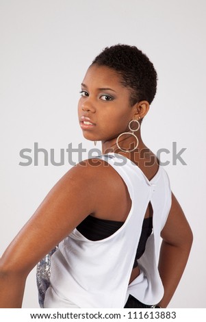 Pretty Black Woman Standing Looking At The Camera Over Her Shoulder ...