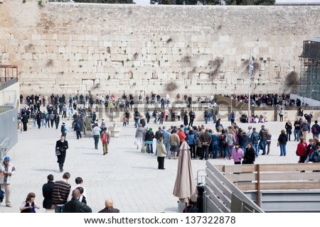 JERUSALEM - FEBRUARY 17: Jews gather to pray at the Wailing Wall, the last remaining wall of Herod\'s Temple and a sacred site for Jews and Christians on February 17, 2013 in Jerusalem, Israel.