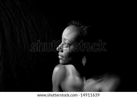 Black woman looking left, black and white, b&w