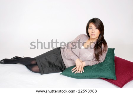 Lovely asian american woman laying down,