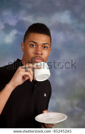 Handsome Black Man Drinking A Cup Of Coffee Or Tea Stock Photo 85245265 ...