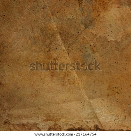 Antique Parchment Amber Texture XXL Old stained creased parchment paper texture amber color
