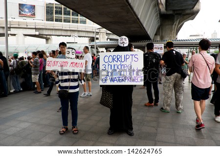 BANGKOK,THAILAND - JUNE16 : Protester showing their slogans during protest against  the Yingluck Shinawatra government at The Bangkok Art and Culture Centre on June16 , 2013 in Bangkok Thailand