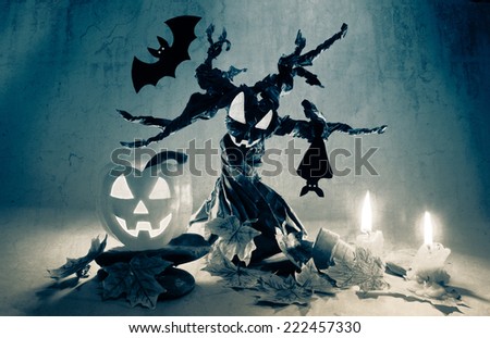 Halloween pumpkin under spooky tree with creepy bats(Fluorescent White Balance )
