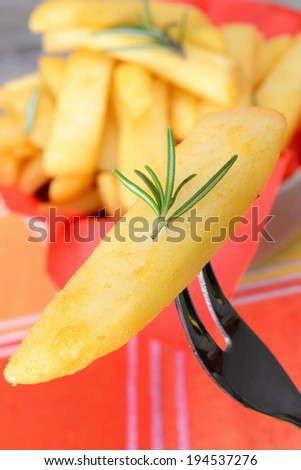 rustic big potatoes slice fried with rosemary aroma