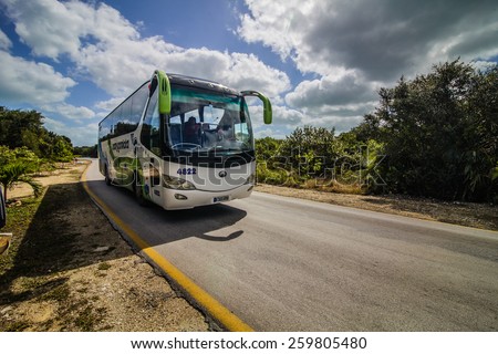 - Cayo Santa Maria, Cuba. February 18th 2015. Shuttle bus that Tourists can use for tree convertible pesos if they want to travel between the different resort on the island.