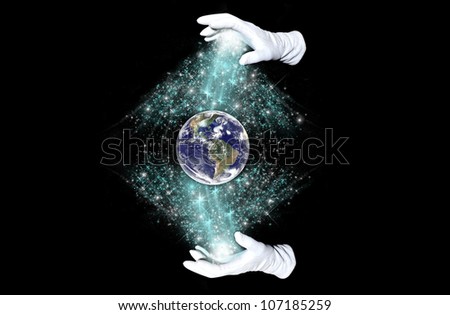 Earth sphere  enveloped by blue stardust on a black background. Elements of this image furnished by NASA