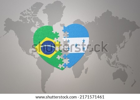 puzzle heart with the national flag of brazil and honduras on a world map background.Concept. 3D illustration Foto stock © 