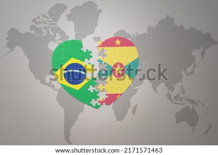 puzzle heart with the national flag of brazil and grenada on a world map background.Concept. 3D illustration Foto stock © 