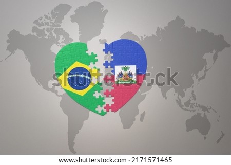 puzzle heart with the national flag of brazil and haiti on a world map background.Concept. 3D illustration Foto stock © 