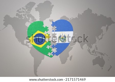 puzzle heart with the national flag of brazil and el salvador on a world map background.Concept. 3D illustration Foto stock © 