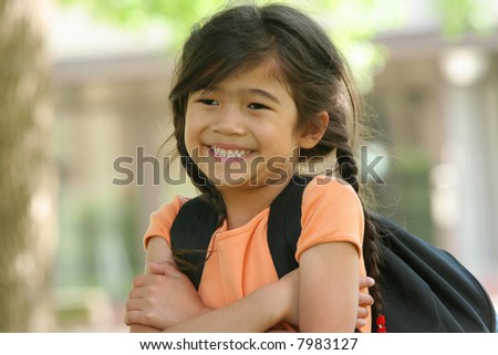 Adorable five year old girl ready for first day of school