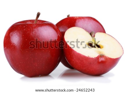 Red gala apples, one cut open to show seeds