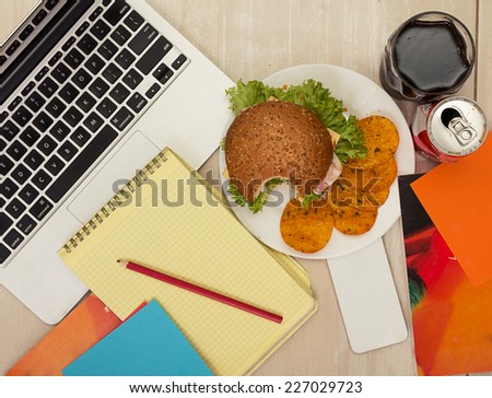 Junk food near a laptop