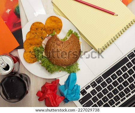 Junk food near a laptop