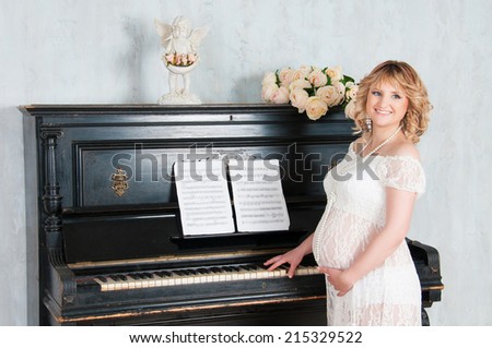 Expectant mother in anticipation of birth of baby. Music of Heart