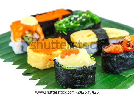 Sushi : Rice wrap seaweed on squid and japan seaweed, Rice and sweet egg on isolated background.
