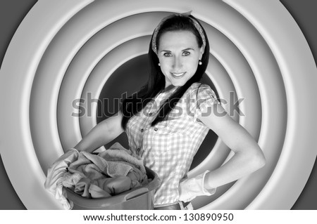 Pin up girl doing laundry. Vintage, retro style black and white photography.