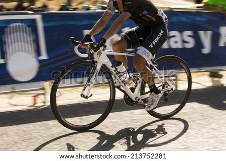 GRANADA, SPAIN - AUGUST 28 - Unknown racers on the competition Tour of Spain (La Vuelta) on August 28, 2014 in Granada, Spain