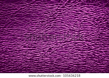 purple leather background with white light reflexes