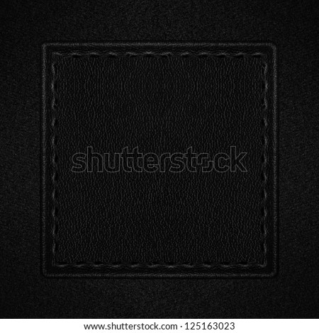 black leather with seam on grey canvas background