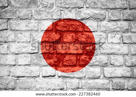 flag of Japan or Japanese banner on brick texture