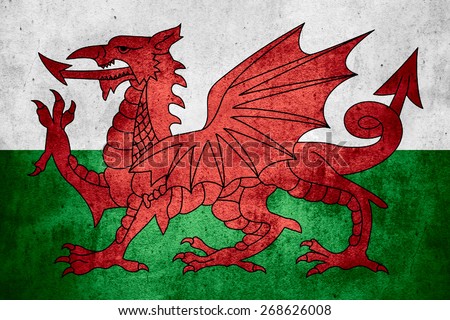 flag of Wales or Welsh banner on rough pattern texture background
