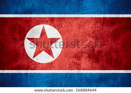 flag of North Korea or North Korean banner on rough pattern texture background